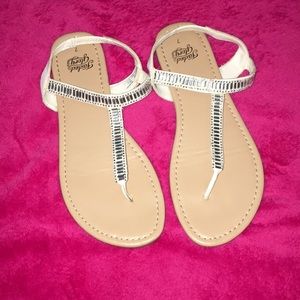 White and tan sandals